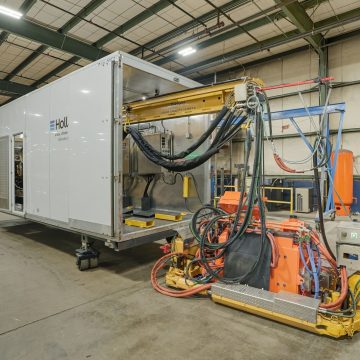 Holland flashbutt welding container for railroad in manufacturing facility
